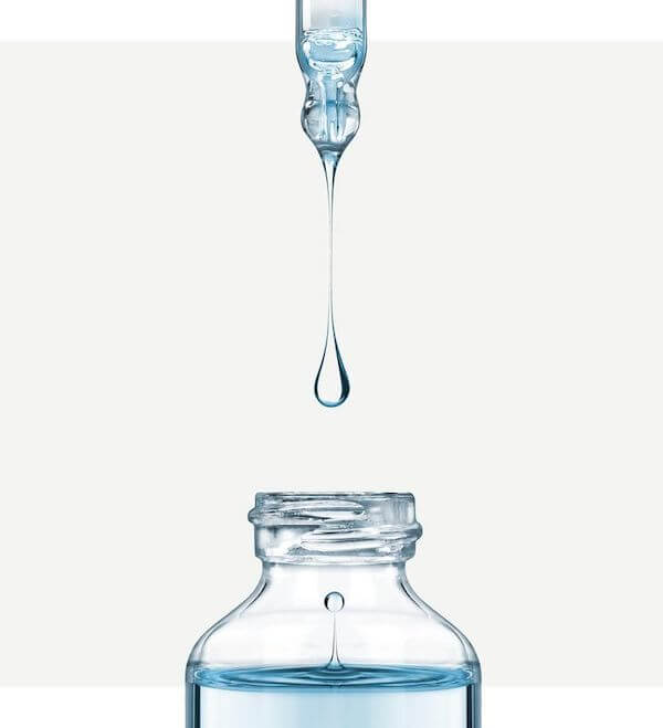 water dropping into a bottle